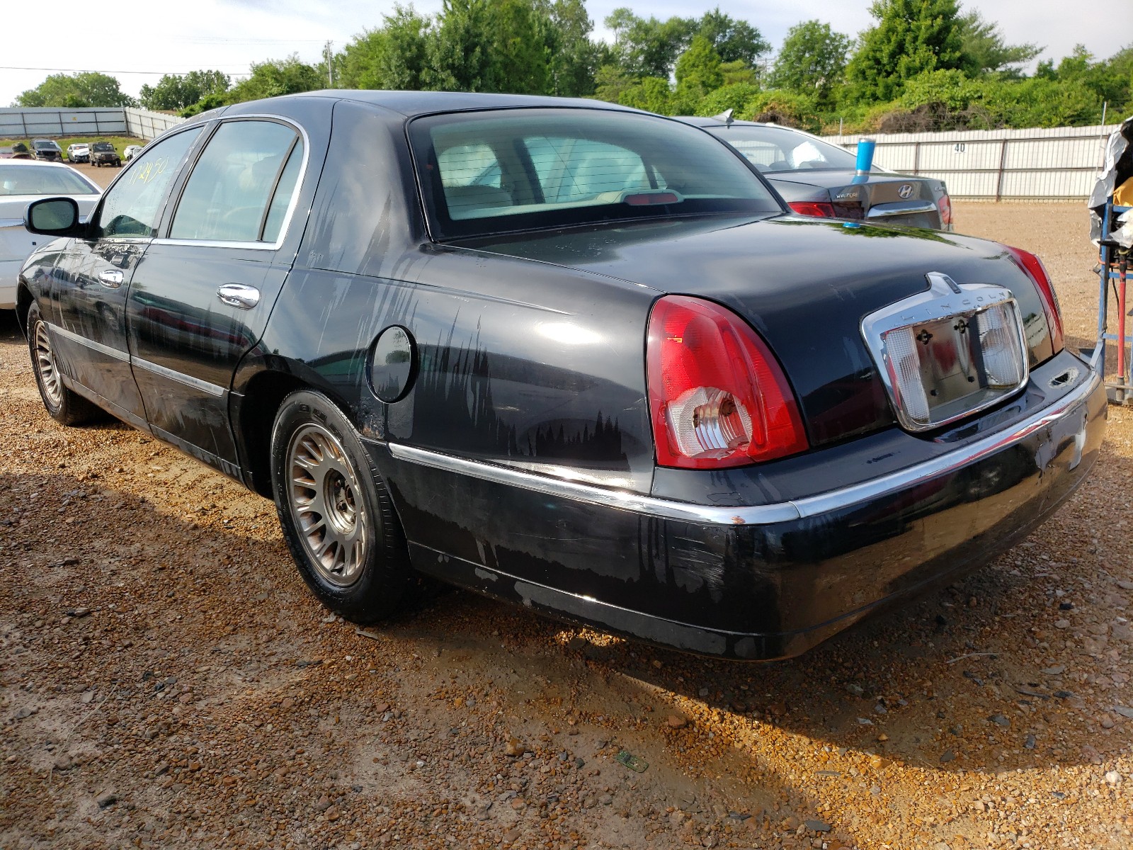 1LNHM83W4YY784293 2000 Lincoln Town Car Cartier