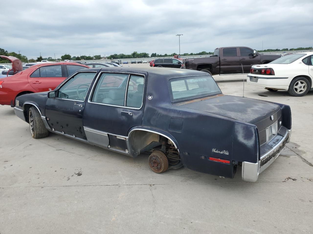 1990 Cadillac Deville VIN: 1G6CD5337L4238206 Lot: 58214584