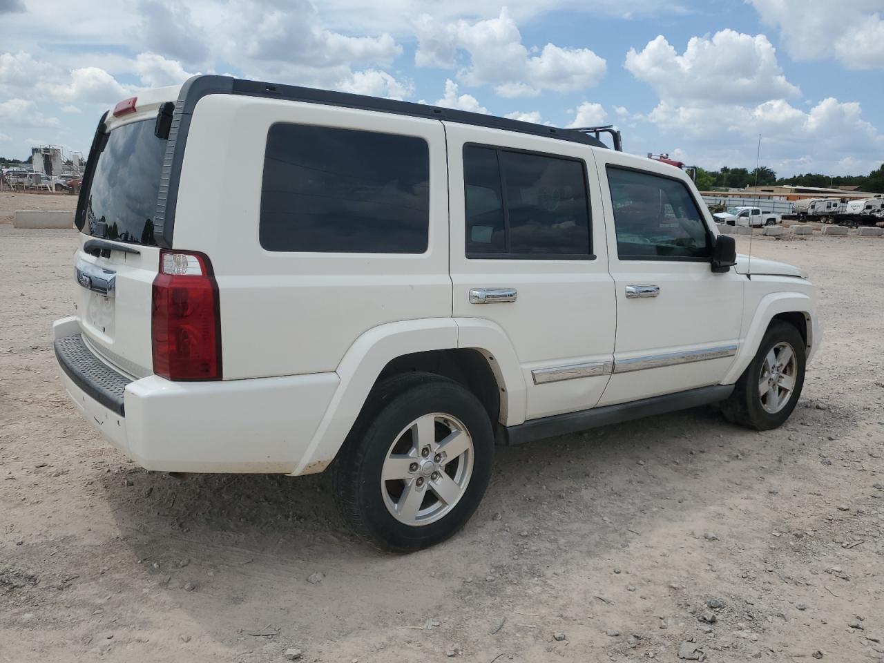 2007 Jeep Commander VIN: 1J8HG48K77C562927 Lot: 64449134