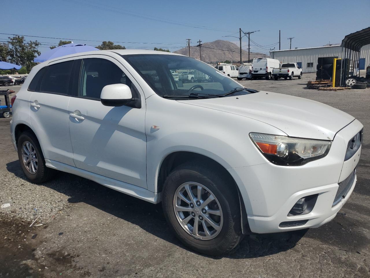 2011 Mitsubishi Outlander Sport Es VIN: JA4AP3AUXBZ002561 Lot: 64846154