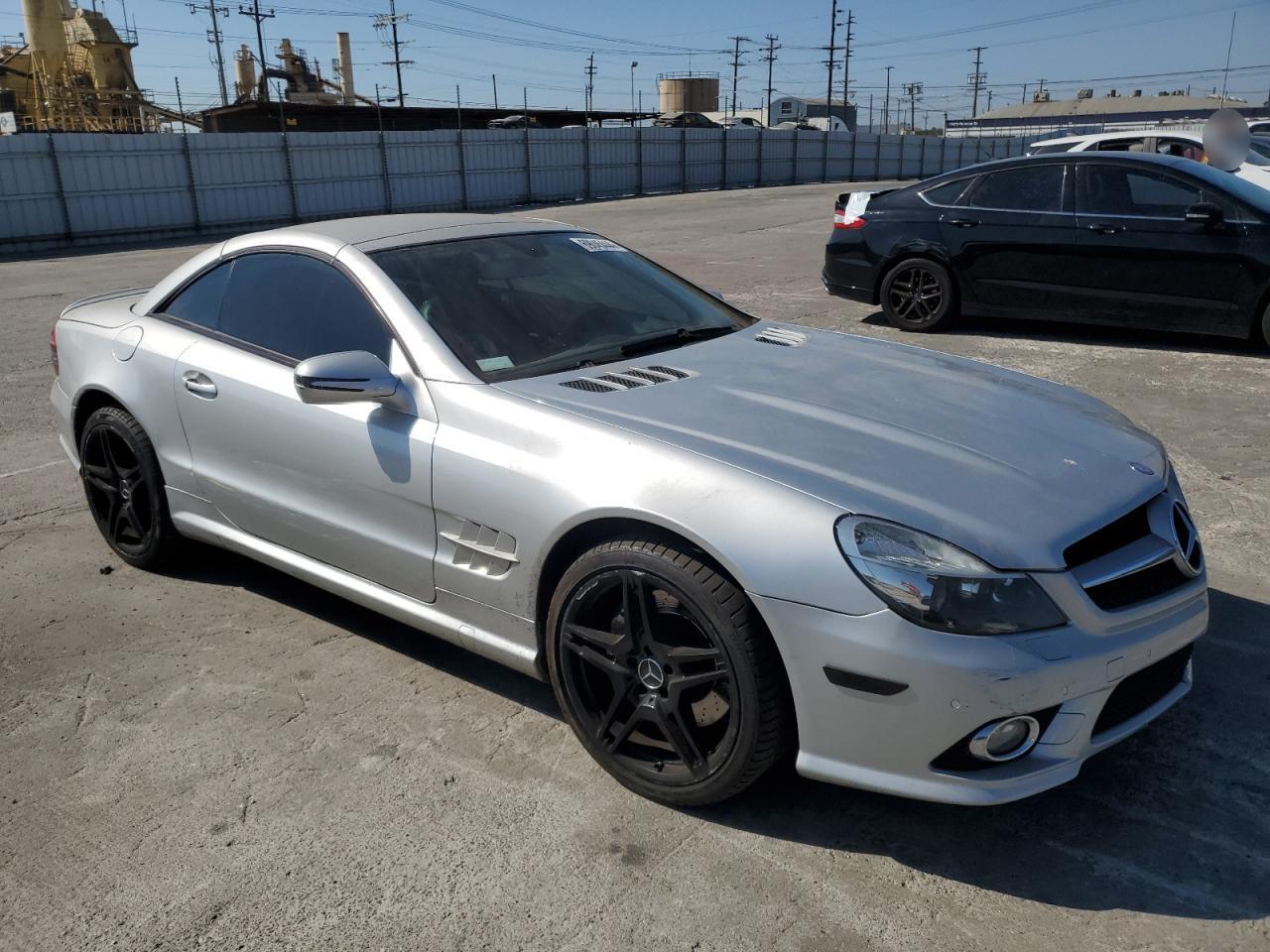 2009 Mercedes-Benz Sl 550 VIN: WDBSK71F09F143733 Lot: 69045444