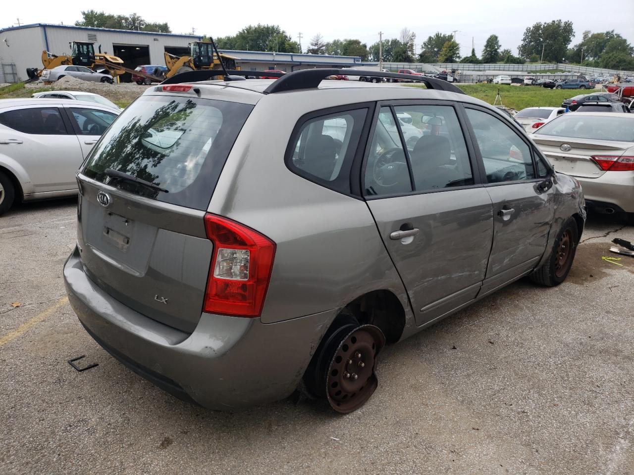 KNAFG528X97235576 2009 Kia Rondo Base