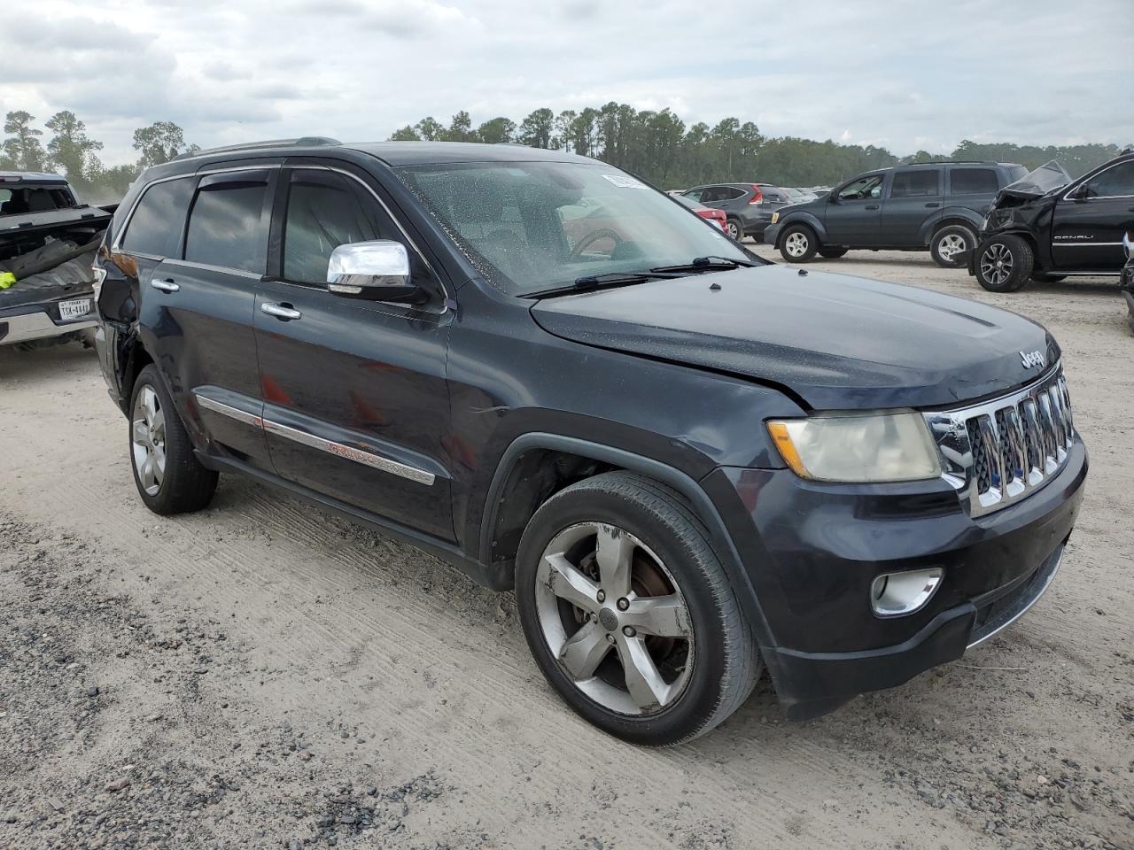 2012 Jeep Grand Cherokee Overland VIN: 1C4RJECG2CC275043 Lot: 70743774