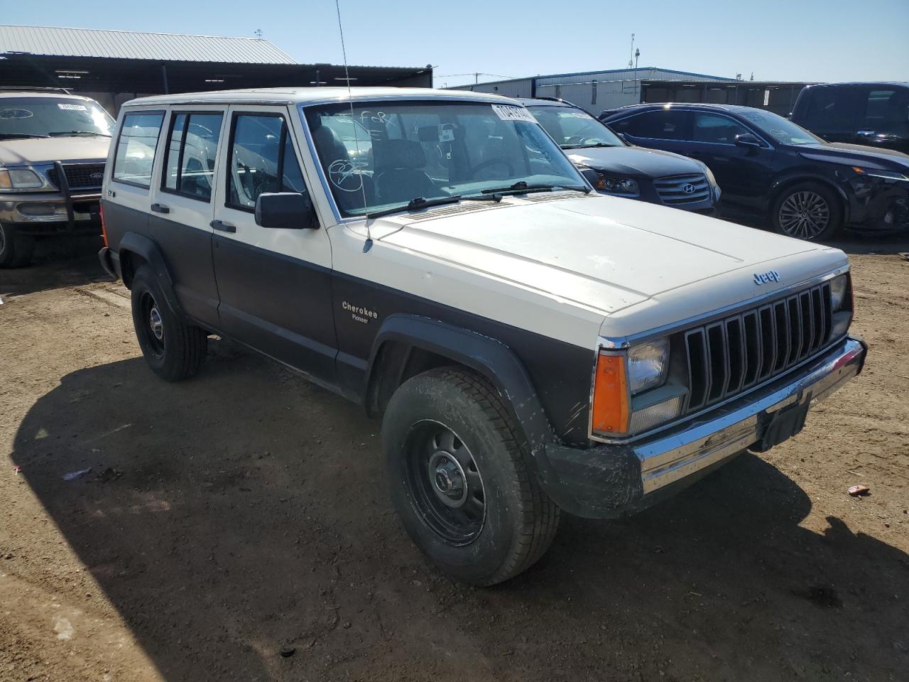 1987 Jeep Cherokee Pioneer VIN: 1JCML7825HT097597 Lot: 70419144