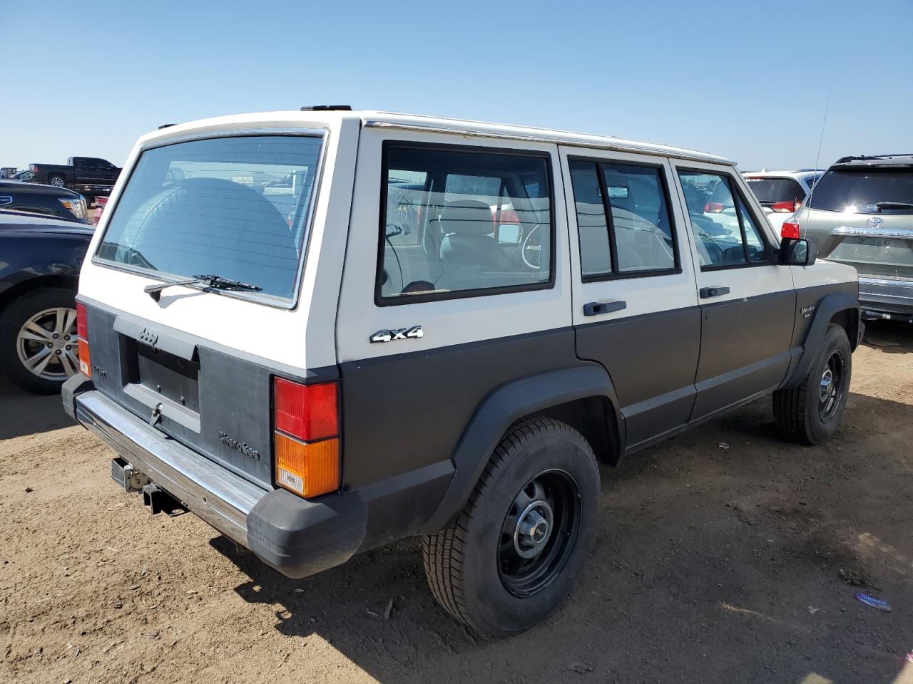 1987 Jeep Cherokee Pioneer VIN: 1JCML7825HT097597 Lot: 70419144