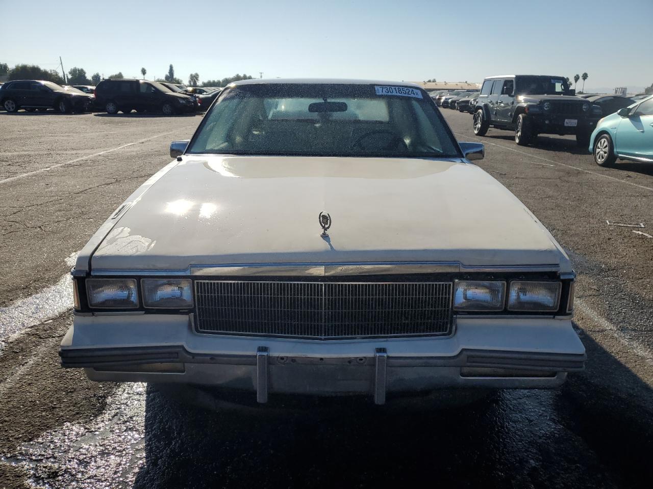 1986 Cadillac Deville Base VIN: 1G6CD4785G4323082 Lot: 73018524