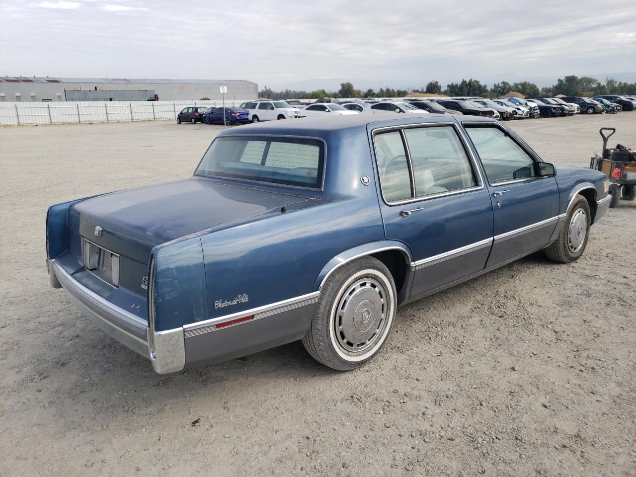 1990 Cadillac Deville VIN: 1G6CD5336L4334313 Lot: 77162944