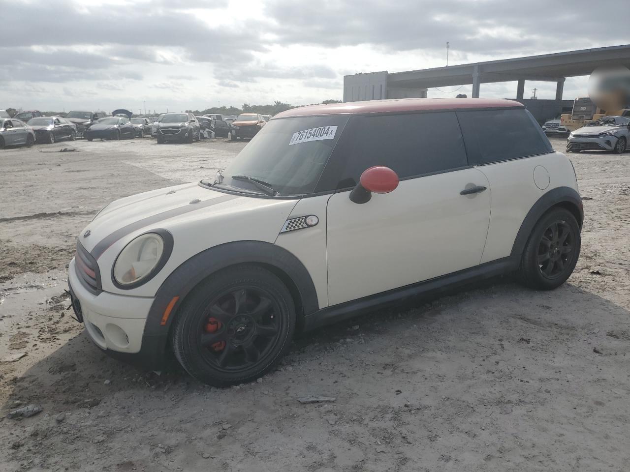 2009 Mini Cooper VIN: WMWMF335X9TW74447 Lot: 76154004