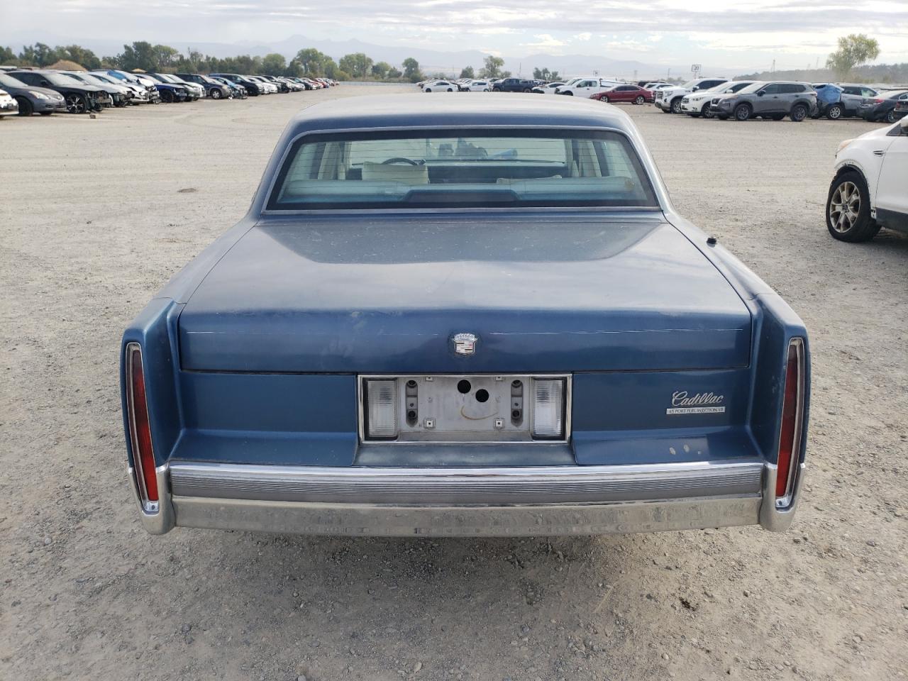 1990 Cadillac Deville VIN: 1G6CD5336L4334313 Lot: 77162944