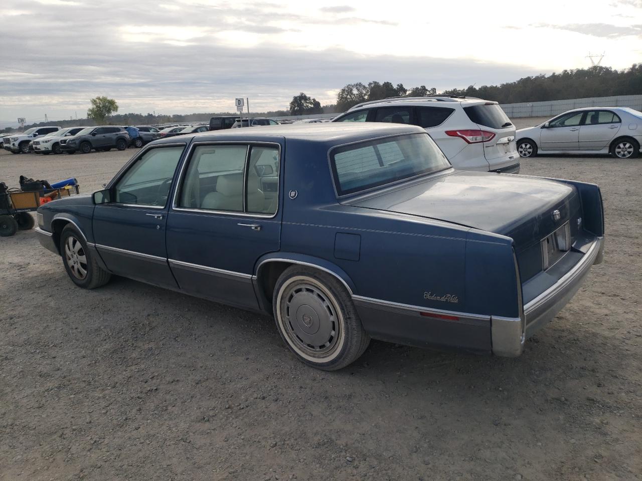 1990 Cadillac Deville VIN: 1G6CD5336L4334313 Lot: 77162944