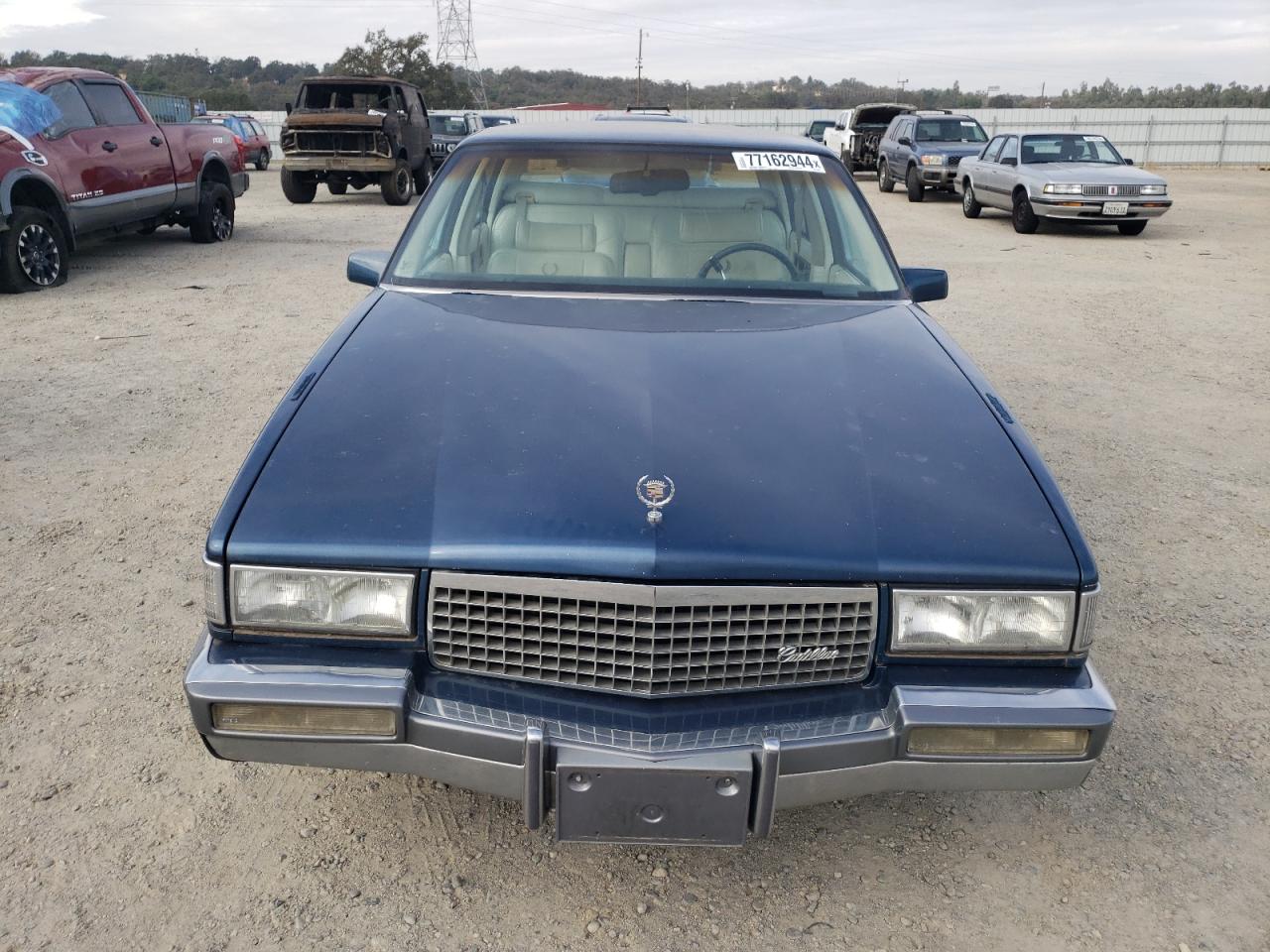 1990 Cadillac Deville VIN: 1G6CD5336L4334313 Lot: 77162944