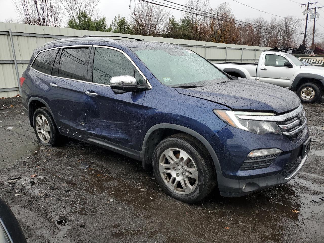 2018 Honda Pilot Touring VIN: 5FNYF6H9XJB015650 Lot: 81300754