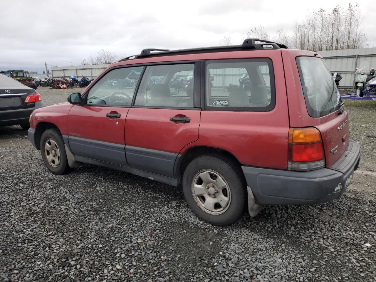 1999 Subaru Forester L VIN: JF1SF6356XH700771 Lot: 80594564