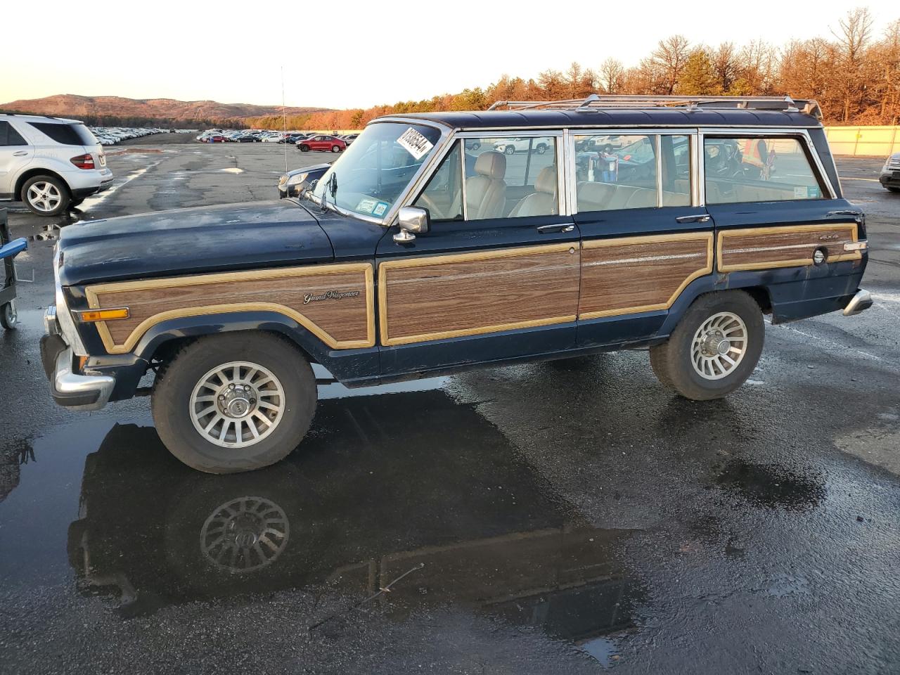 1987 Jeep Grand Wagoneer VIN: 1JCNJ15U2HT153606 Lot: 81936544