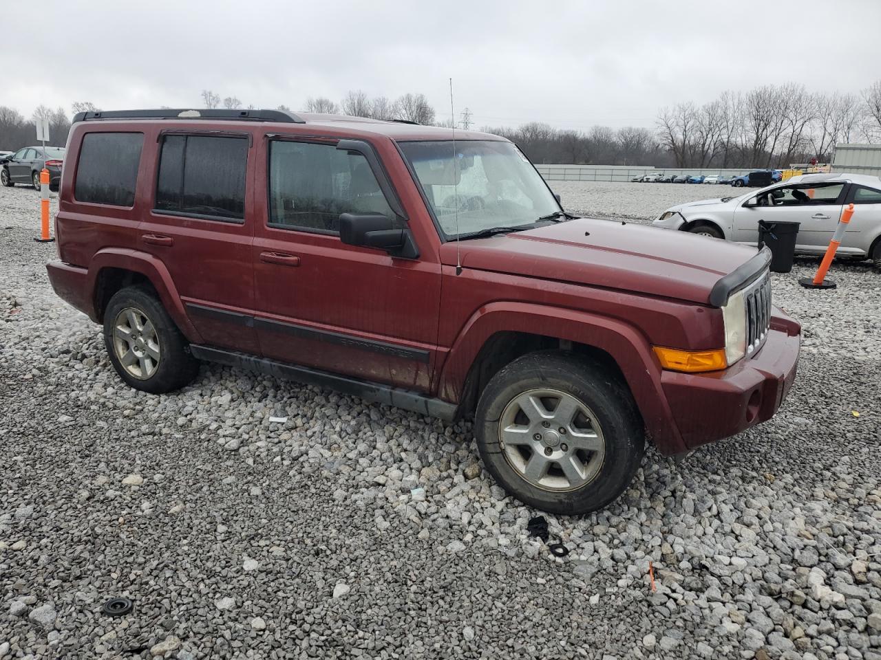 2007 Jeep Commander VIN: 1J8HG48K97C643699 Lot: 81299874