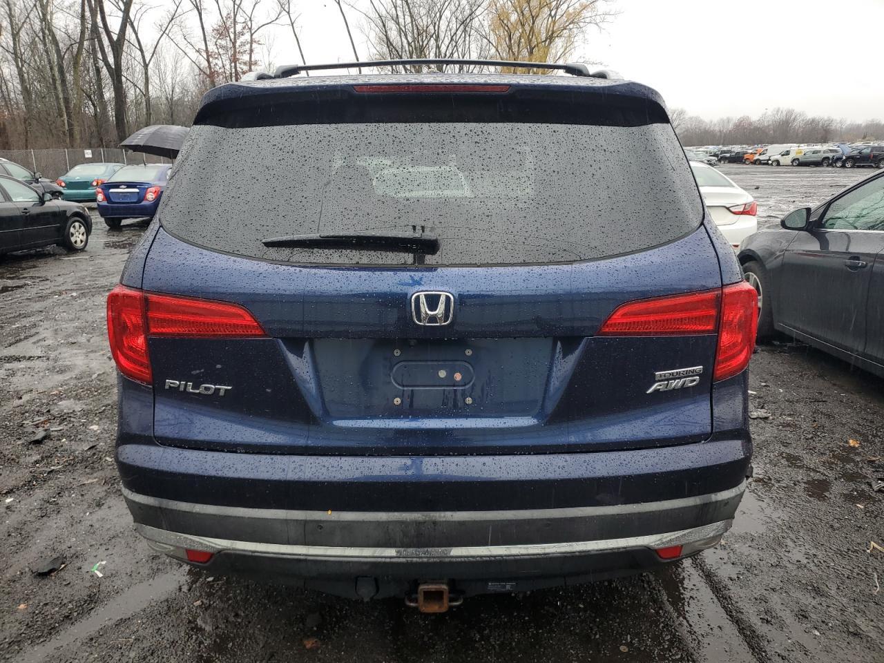 2018 Honda Pilot Touring VIN: 5FNYF6H9XJB015650 Lot: 81300754