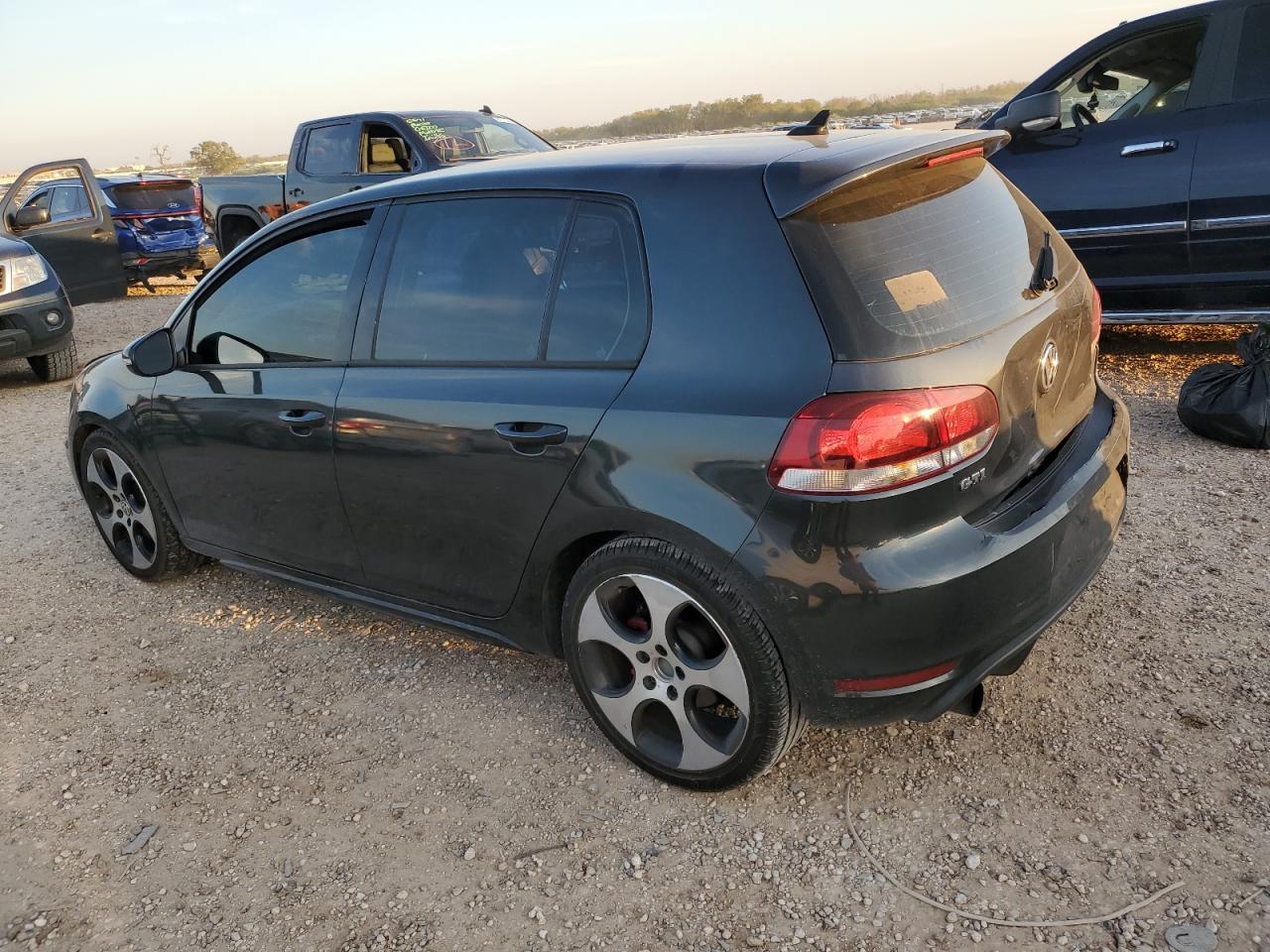 2012 Volkswagen Gti VIN: WVWGV7AJXCW077718 Lot: 82325234