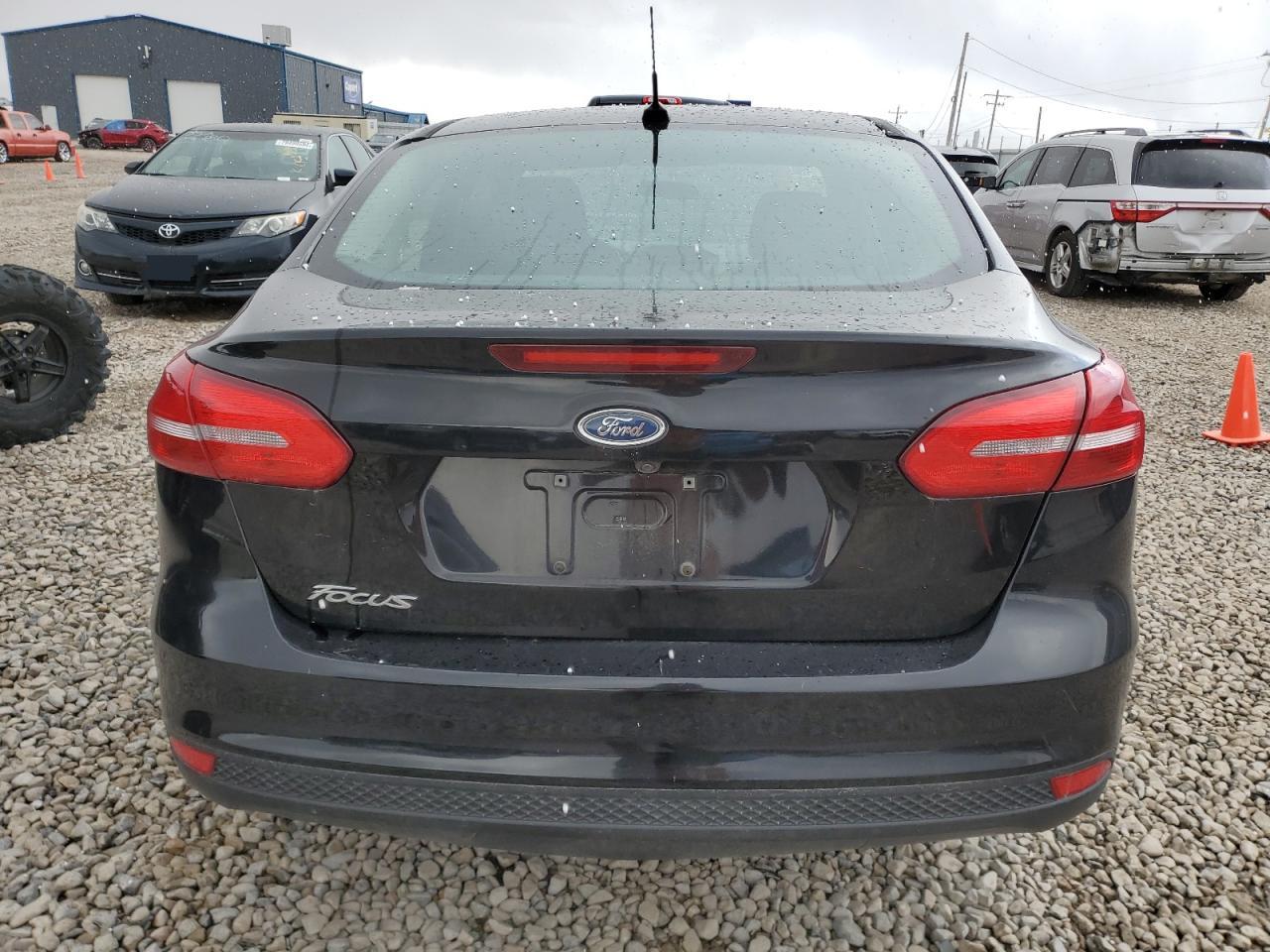 2017 Ford Focus S VIN: 1FADP3E20HL258253 Lot: 79191024