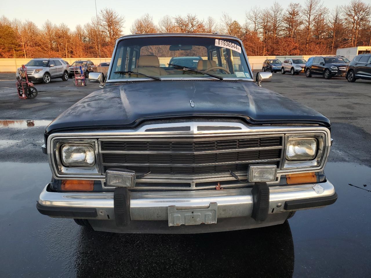 1987 Jeep Grand Wagoneer VIN: 1JCNJ15U2HT153606 Lot: 81936544