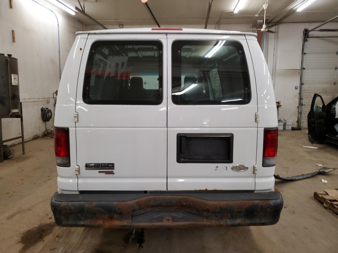 1FTNE2EL7CDA60912 2012 Ford Econoline E250 Van