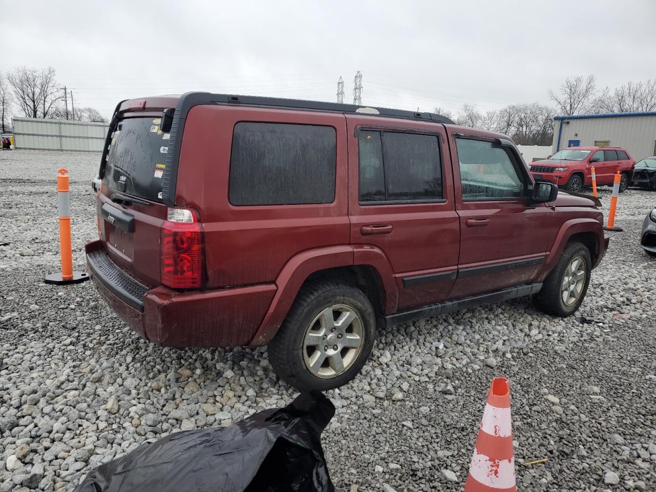 2007 Jeep Commander VIN: 1J8HG48K97C643699 Lot: 81299874