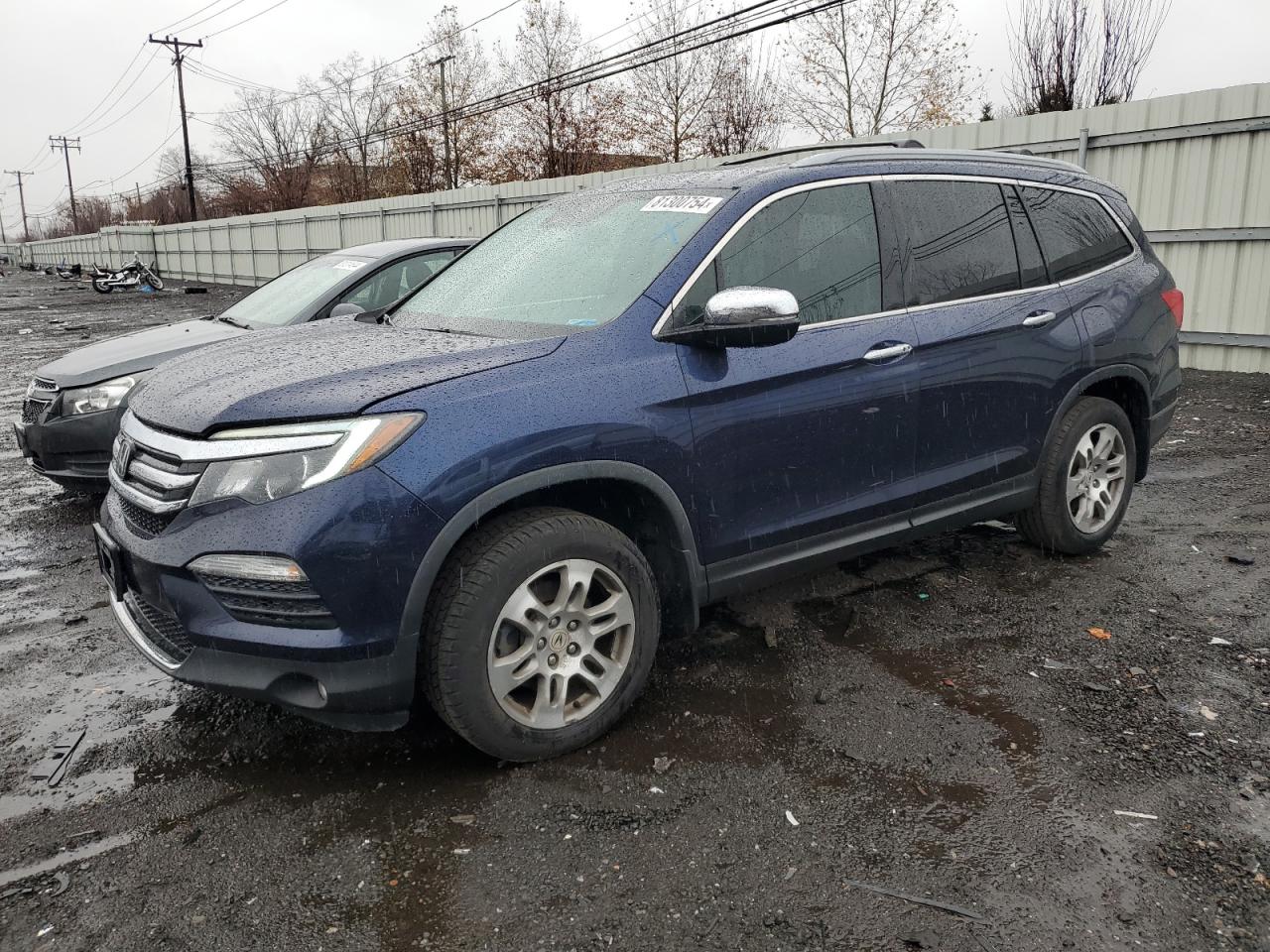 2018 Honda Pilot Touring VIN: 5FNYF6H9XJB015650 Lot: 81300754