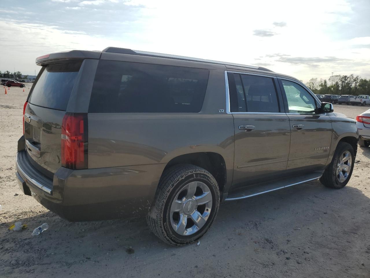 2016 Chevrolet Suburban C1500 Ltz VIN: 1GNSCJKC1GR110145 Lot: 80772794