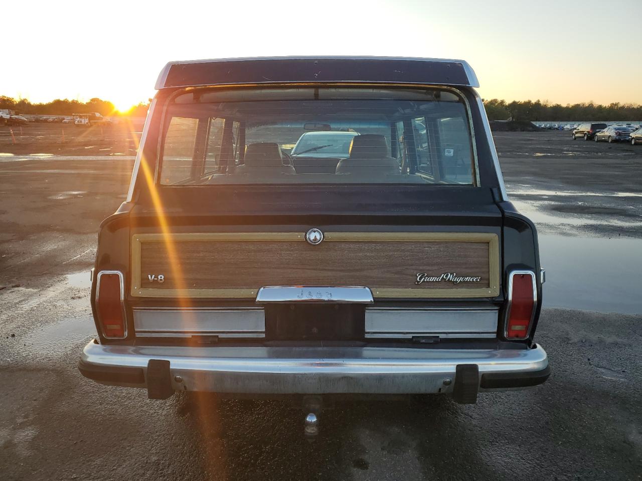 1987 Jeep Grand Wagoneer VIN: 1JCNJ15U2HT153606 Lot: 81936544