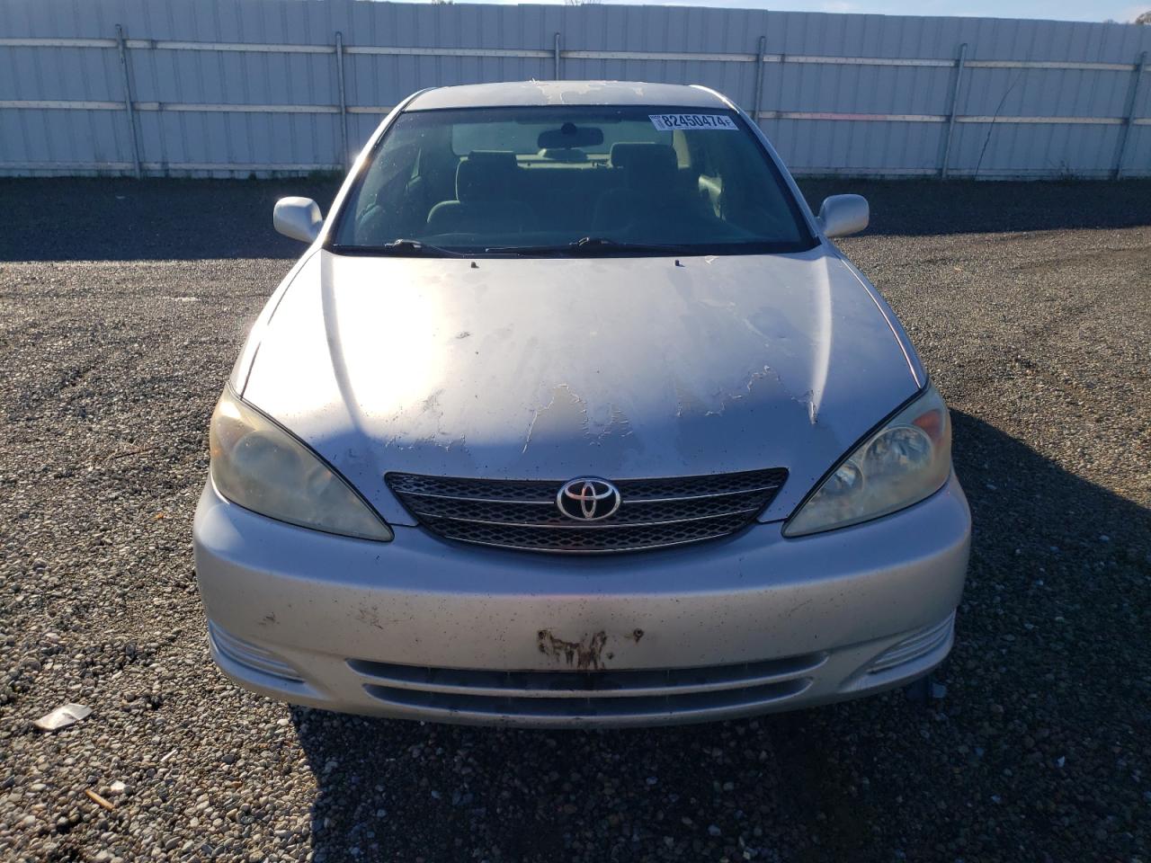 2003 Toyota Camry Le VIN: 4T1BF30K93U557105 Lot: 82450474