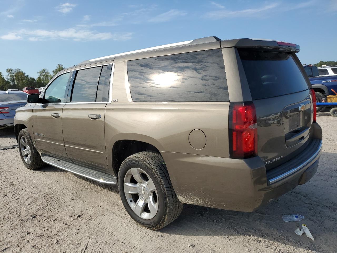 2016 Chevrolet Suburban C1500 Ltz VIN: 1GNSCJKC1GR110145 Lot: 80772794