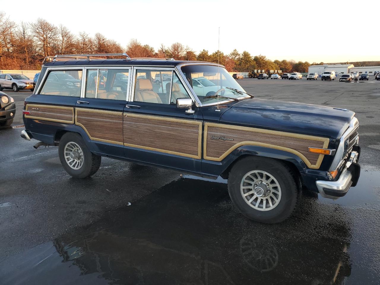 1987 Jeep Grand Wagoneer VIN: 1JCNJ15U2HT153606 Lot: 81936544