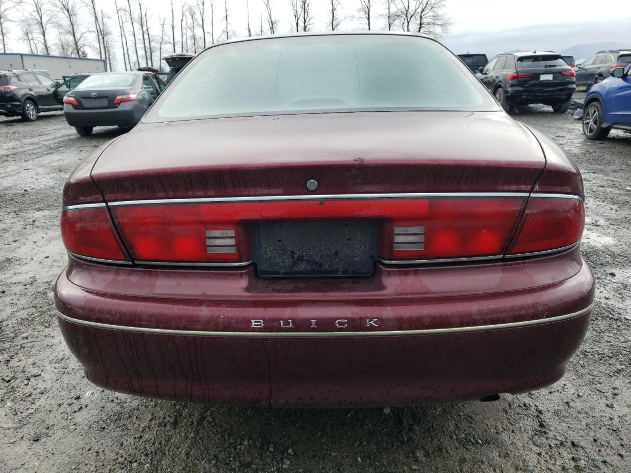 1999 Buick Century Limited VIN: 2G4WY52M2X1506861 Lot: 84730204