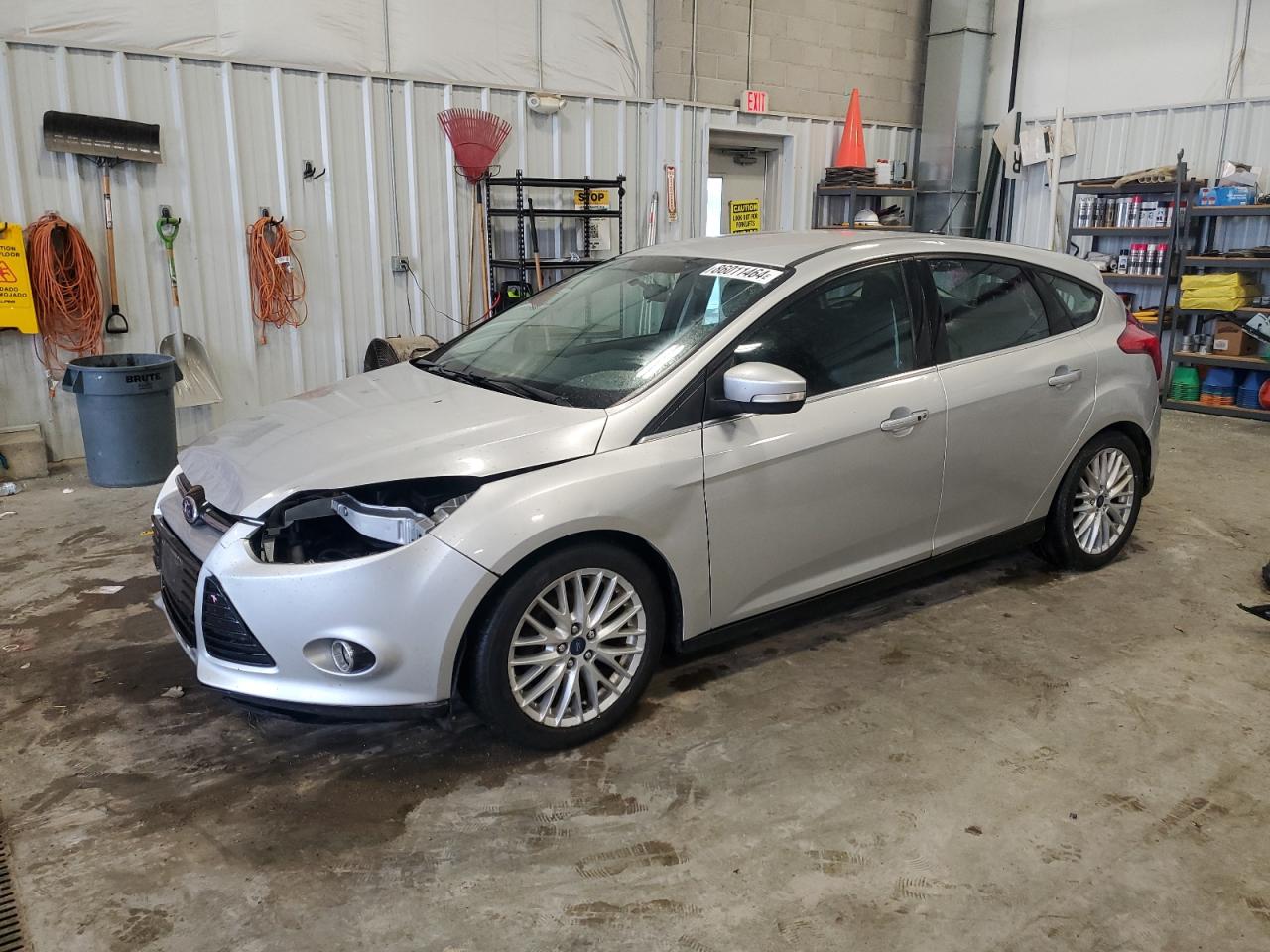 2014 Ford Focus Titanium VIN: 1FADP3N29EL340249 Lot: 86011464