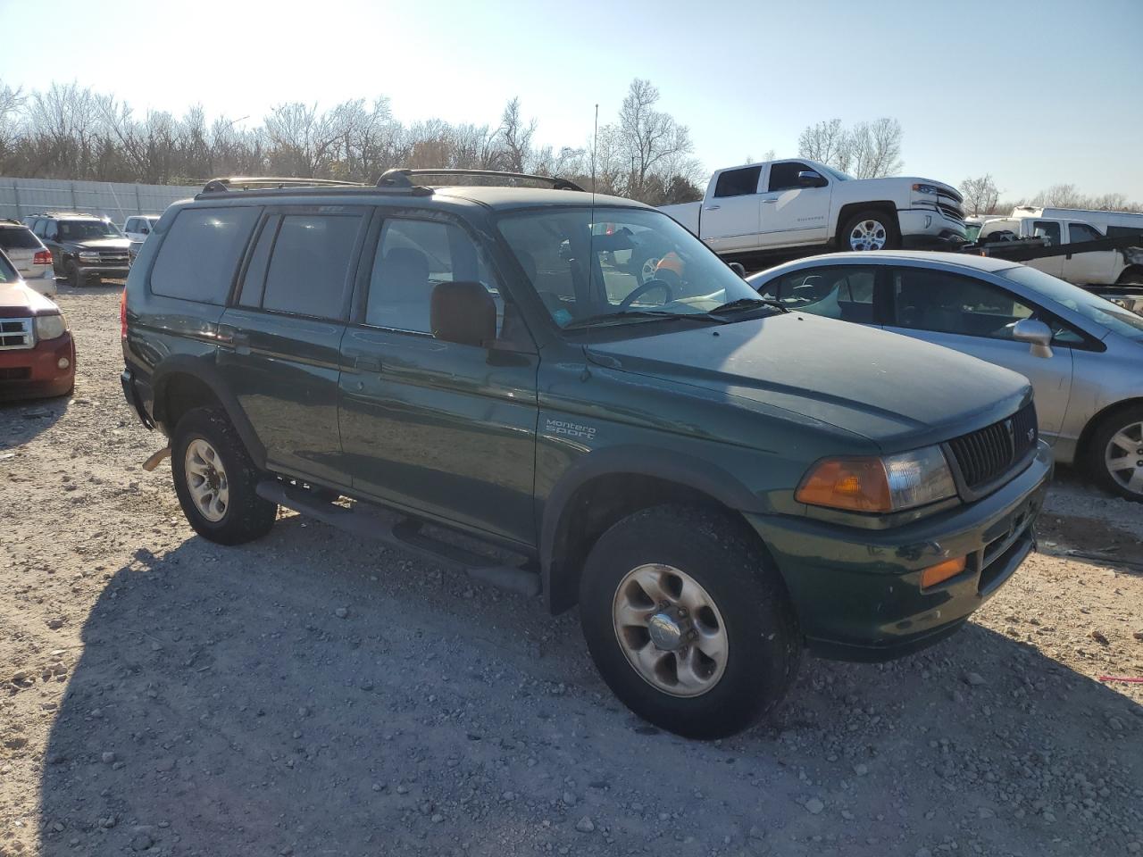 1999 Mitsubishi Montero Sport Ls VIN: JA4LS31H5XP033598 Lot: 85609464