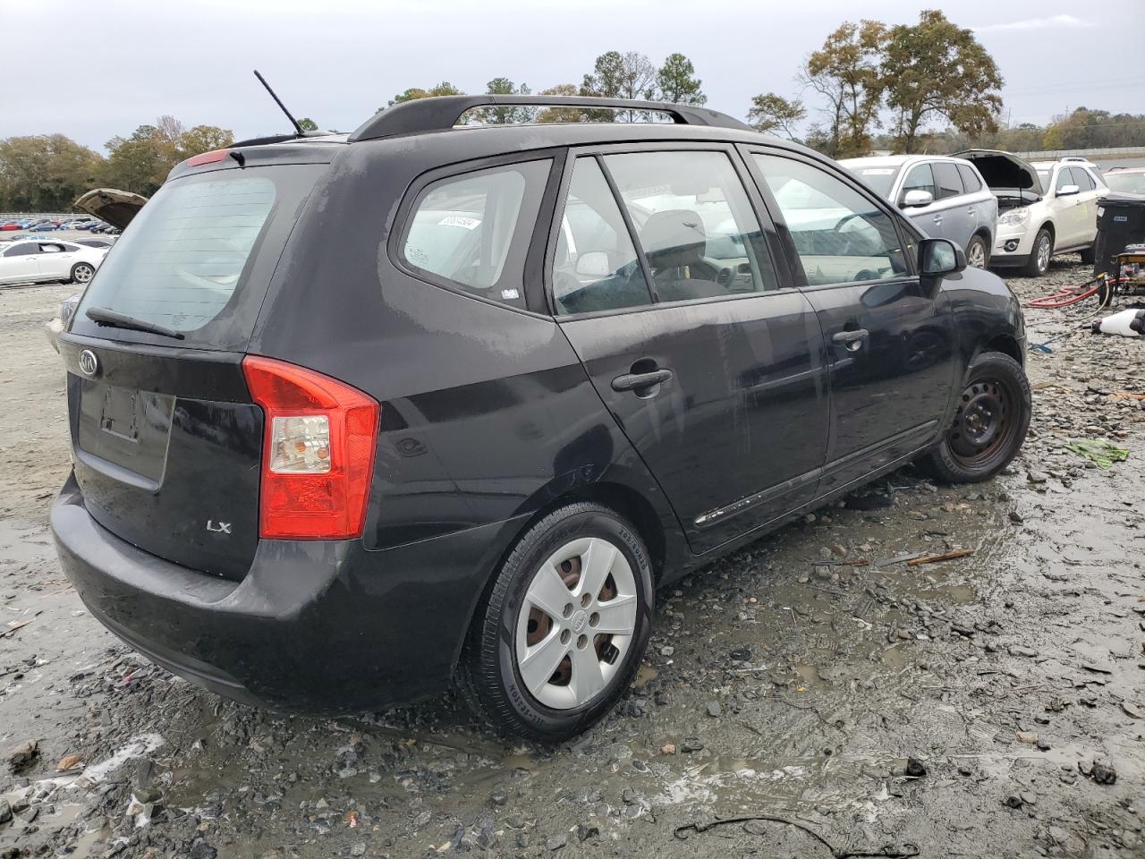 2009 Kia Rondo Base VIN: KNAFG528697260135 Lot: 83556604