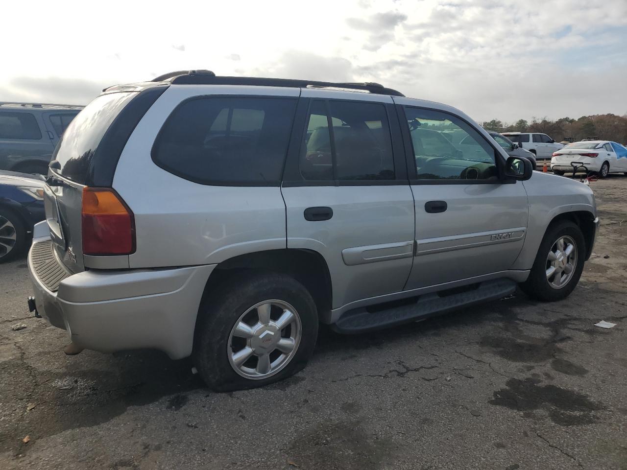 2004 GMC Envoy VIN: 1GKDS13S342230323 Lot: 84998544