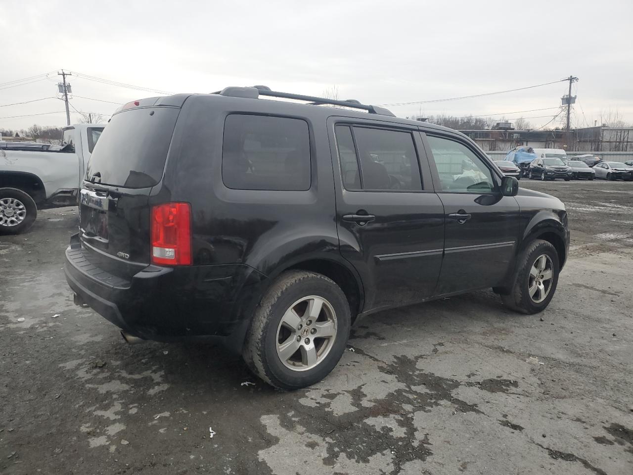 2011 Honda Pilot Exl VIN: 5FNYF4H54BB077807 Lot: 84019634