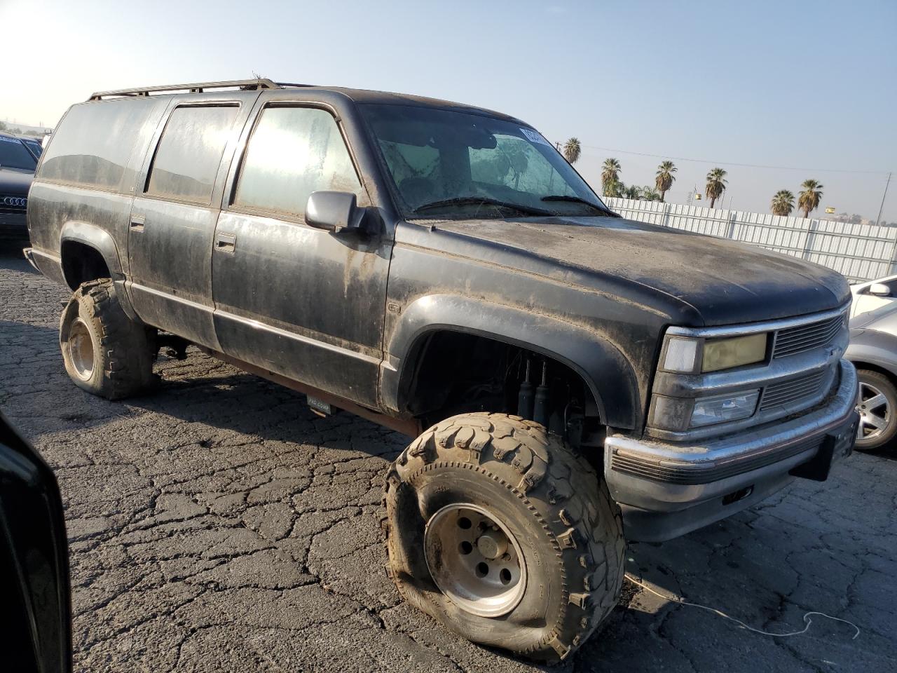 1996 Chevrolet Suburban K1500 VIN: 1GNFK16R4TJ409561 Lot: 83247624