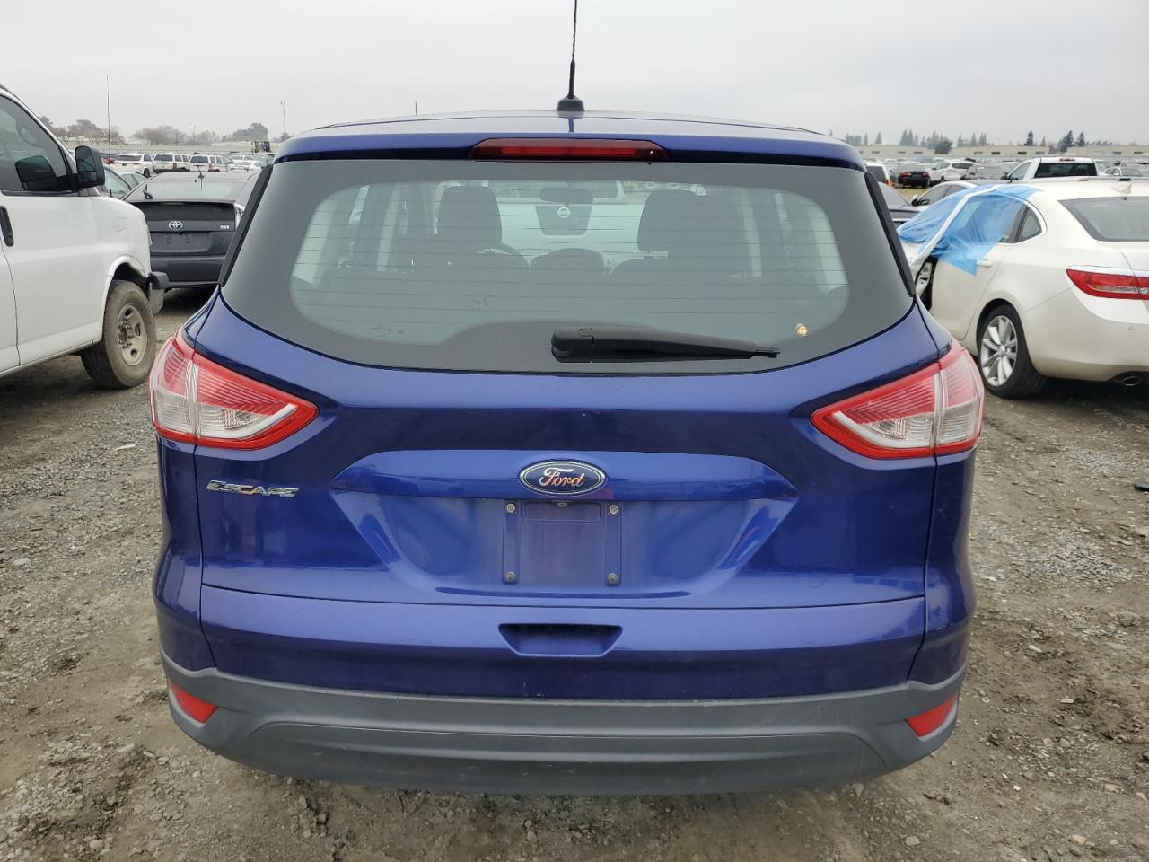 2014 Ford Escape S VIN: 1FMCU0F77EUB16586 Lot: 85899364