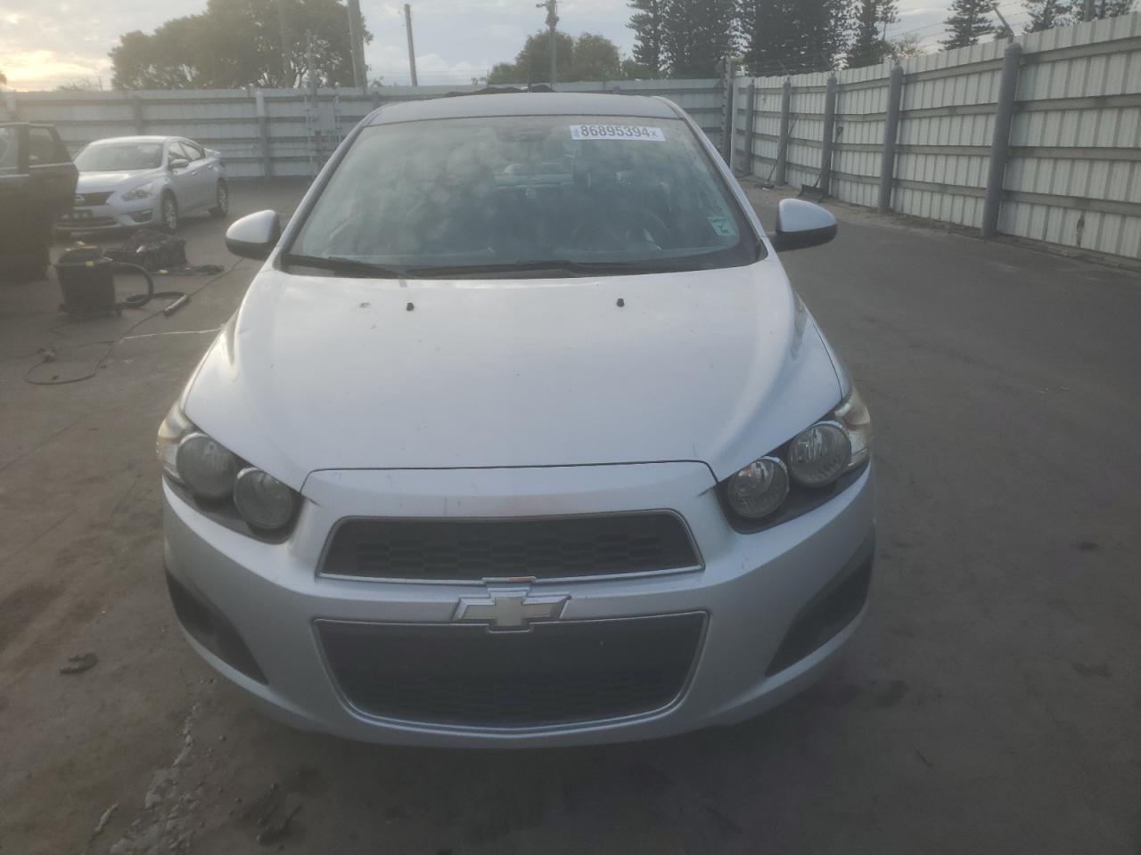 2012 Chevrolet Sonic Ls VIN: 1G1JB5SHXC4120165 Lot: 86895394