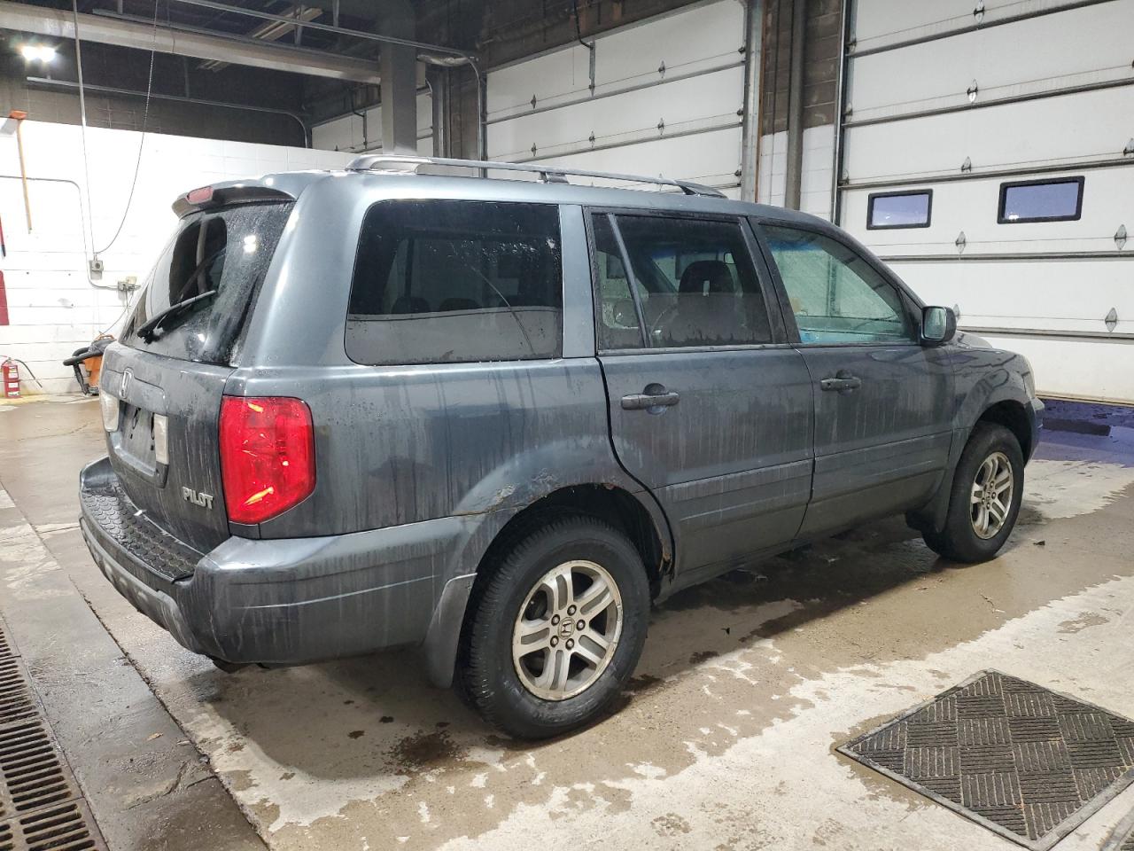 2005 Honda Pilot Exl VIN: 2HKYF18695H501026 Lot: 86844094