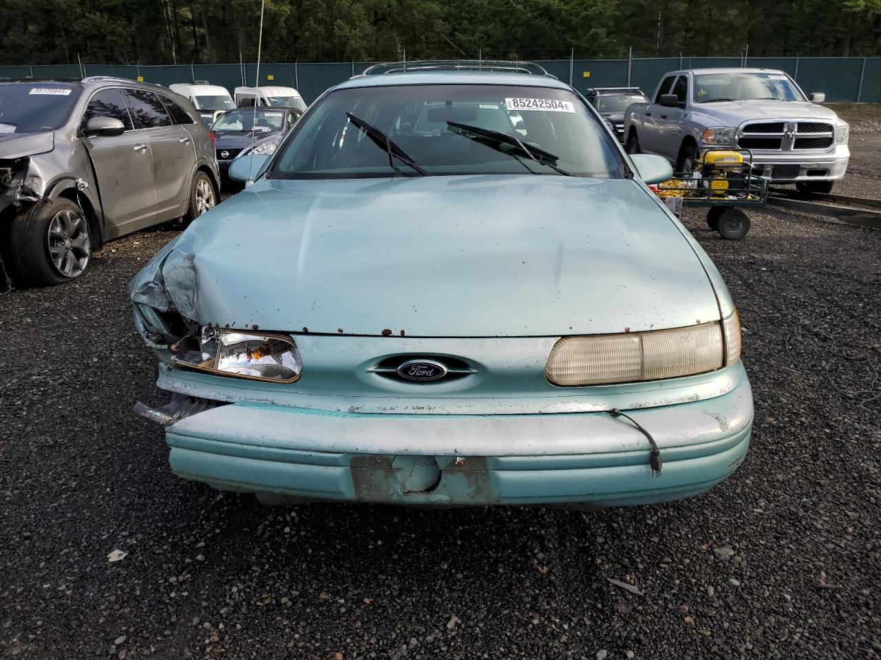 1994 Ford Taurus Gl VIN: 1FALP5747RG236623 Lot: 85242504