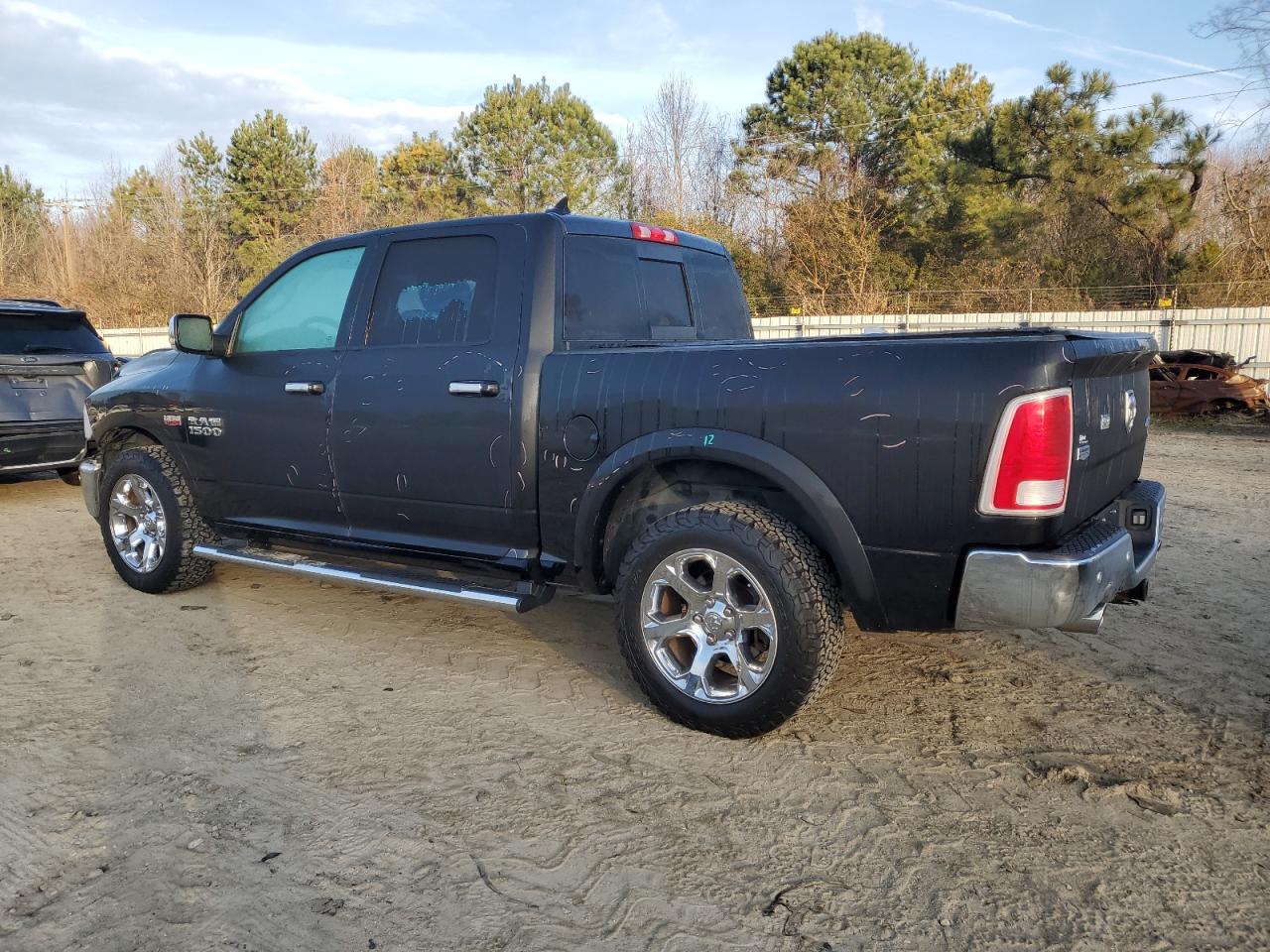 2016 Ram 1500 Laramie VIN: 1C6RR7NT9GS386478 Lot: 82902574