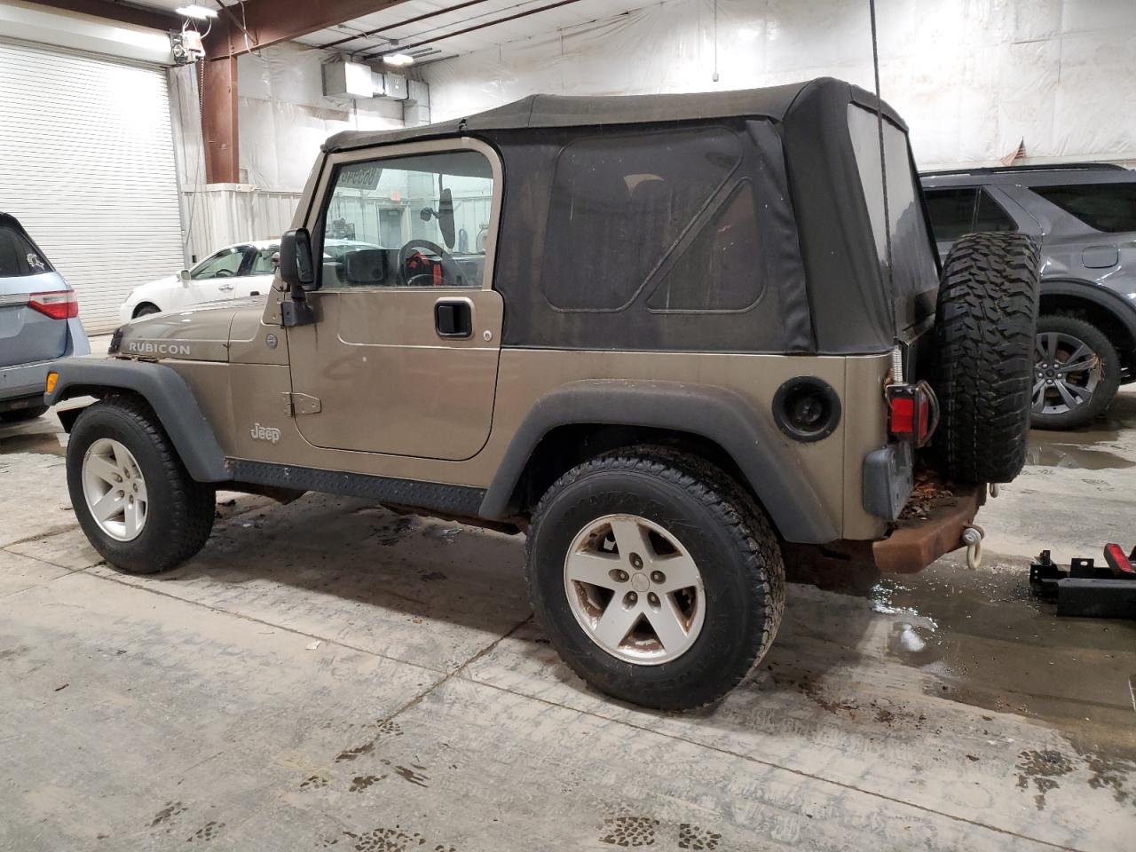 2004 Jeep Wrangler / Tj Rubicon VIN: 1J4FA69S34P785281 Lot: 86594874