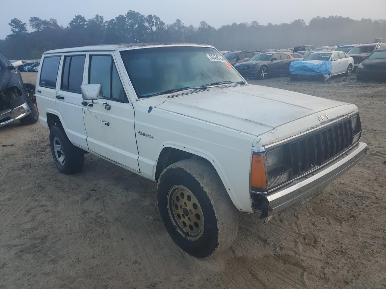 1987 Jeep Cherokee Pioneer VIN: 1JCMR7829HT163602 Lot: 85463784