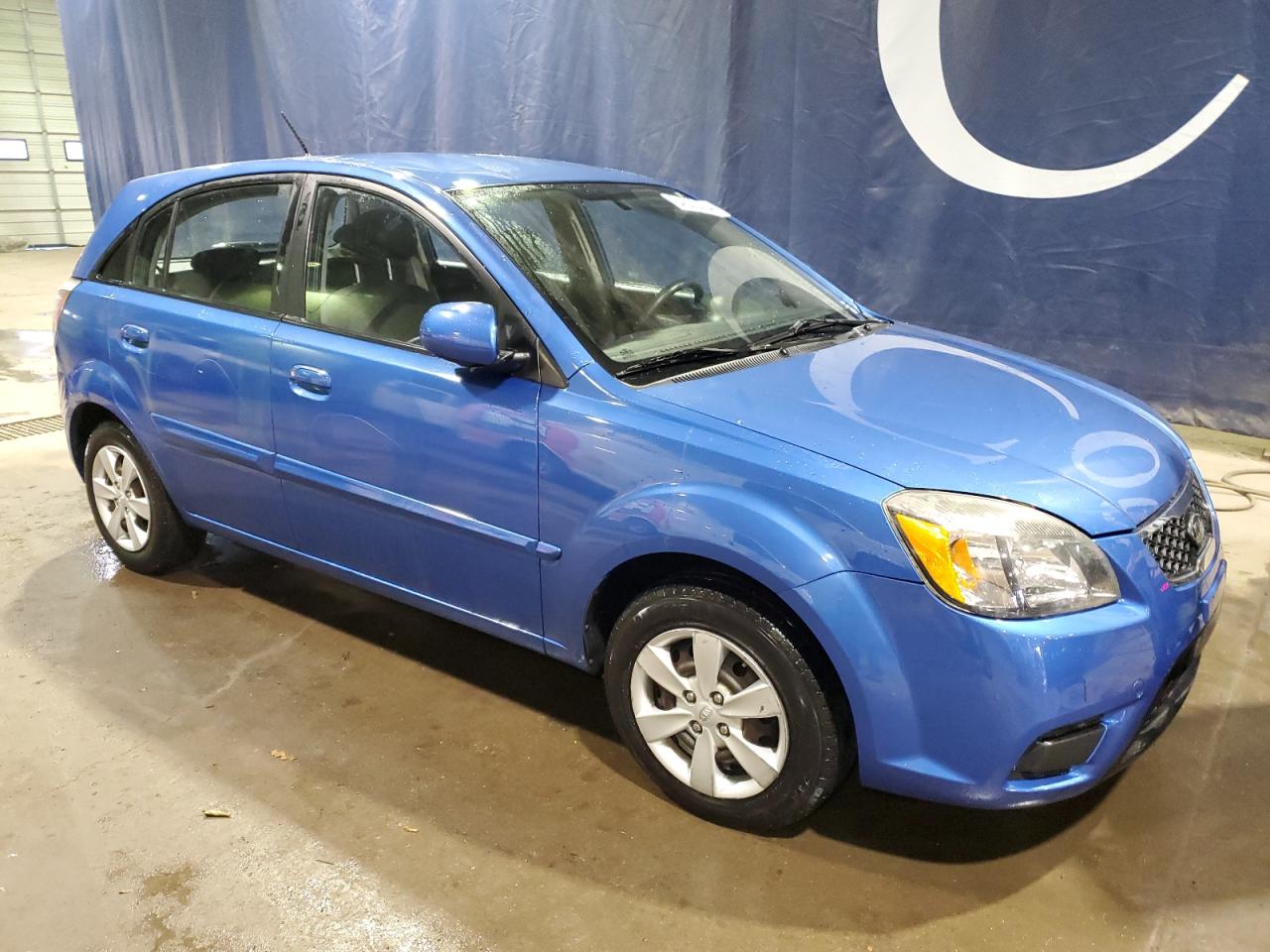 2010 Kia Rio Lx VIN: KNADH5A3XA6700278 Lot: 84023494