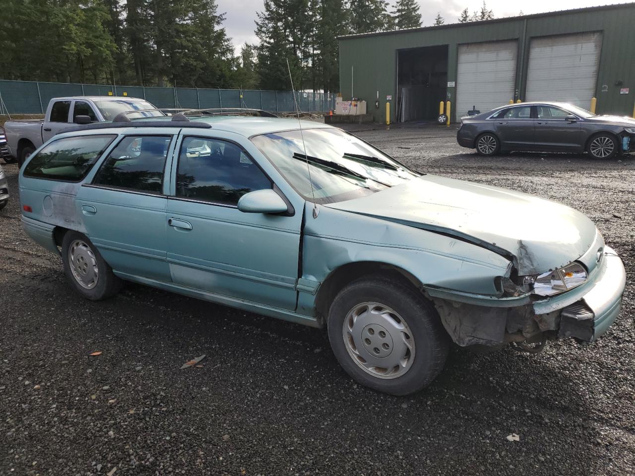 1994 Ford Taurus Gl VIN: 1FALP5747RG236623 Lot: 85242504