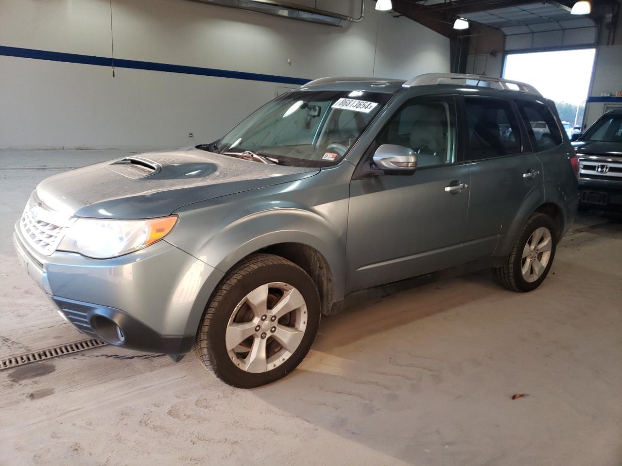 2011 Subaru Forester Touring VIN: JF2SHGGC9BH739108 Lot: 86813654