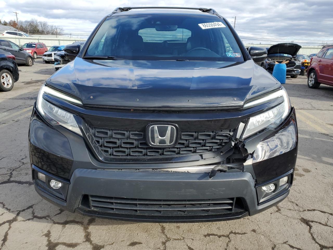 2020 Honda Passport Elite VIN: 5FNYF8H06LB018531 Lot: 86559494