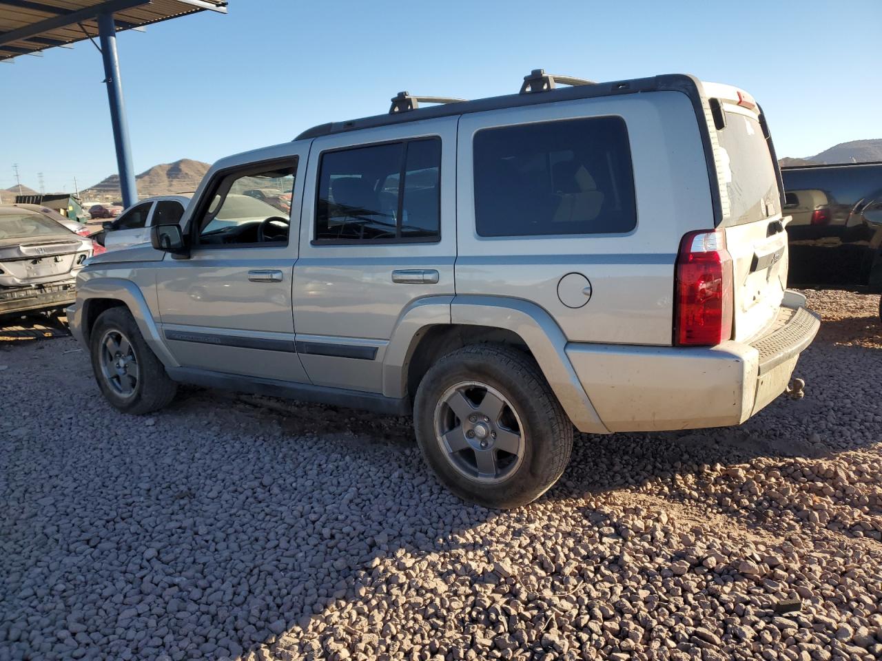 2007 Jeep Commander VIN: 1J8HH48N67C595974 Lot: 84297944